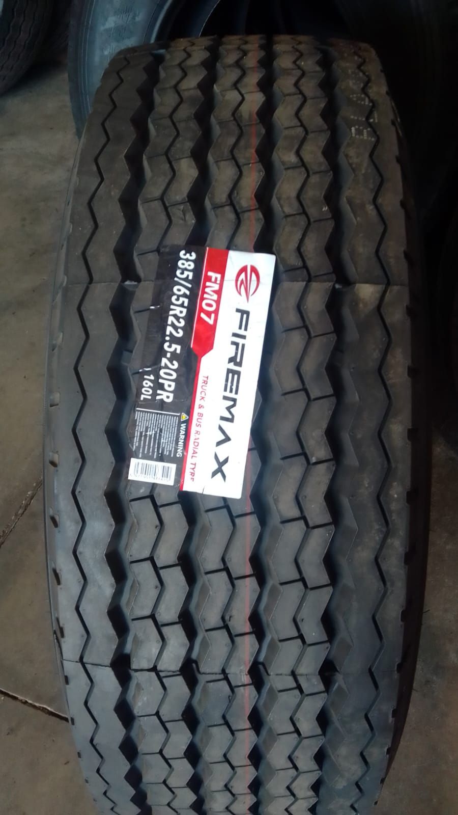 A new 385/65R22.5 steer tyre in 3G Tyres' warehouse in Roodepoort
